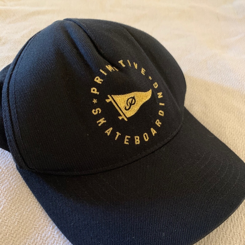 Primitive black gold hat